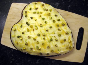 Honey and Lemon cake with drizzled honey and pistachio decoration