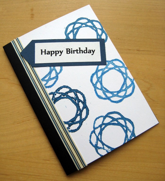 Lino printed Spirograph card with stripy ribbon