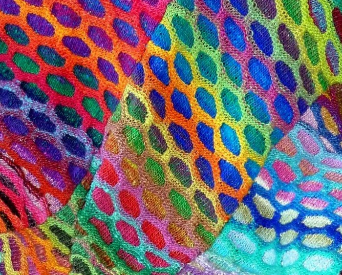 Two color variegated yarn blanket - photo from The Musings of a Yarn Mom